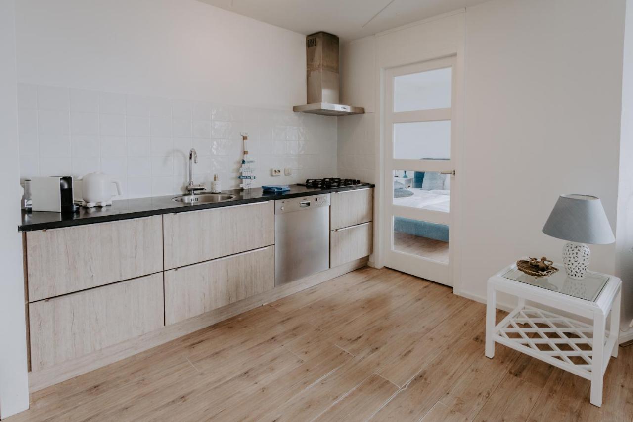 Stijlvol Appartement Op Strand Makkum Esterno foto